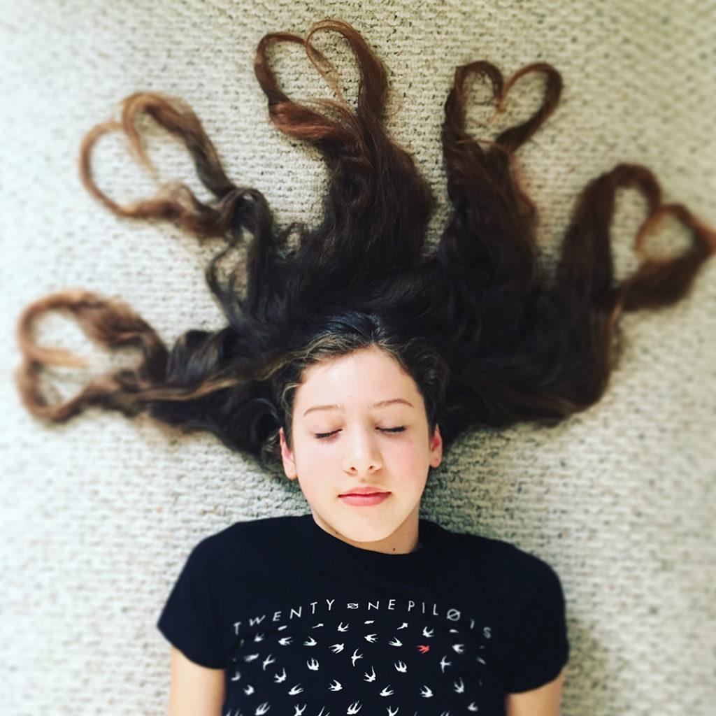 Picture of Shelby, owner of Shelby's T's  a T-shirt shop Macomb County, MI.